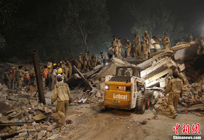 At least 42 people died and another 83 sustained injuries when a five-storey building collapsed in a congested East Delhi residential area on Monday night. The incident, which triggered much panic in the area, took place at 8.20 pm in Lalita Park, New Delhi, India. The building, which housed around 200 people, mostly labourers, came down like a pack of cards and trapped the occupants under the debris. [Chinanews.com]