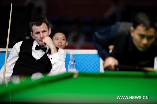 Peter Edward Gilchrist of Singapore looks on during the men's English Billiards Singles semifinal against Oo Nay Thaway Oo of Myanmar at the 16th Asian Games held in Guangzhou, capital of south China's Guangdong Province, Nov. 14, 2010. Peter Edward Gilchrist lost the match 2-3 and took the bronze. (Xinhua/Jiang Kehong)