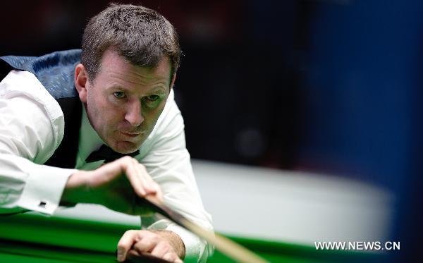 Peter Edward Gilchrist of Singapore competes during the men's English Billiards Singles semifinal against Oo Nay Thaway Oo of Myanmar at the 16th Asian Games held in Guangzhou, capital of south China's Guangdong Province, Nov. 14, 2010. Peter Edward Gilchrist lost the match 2-3 and took the bronze. (Xinhua/Jiang Kehong)