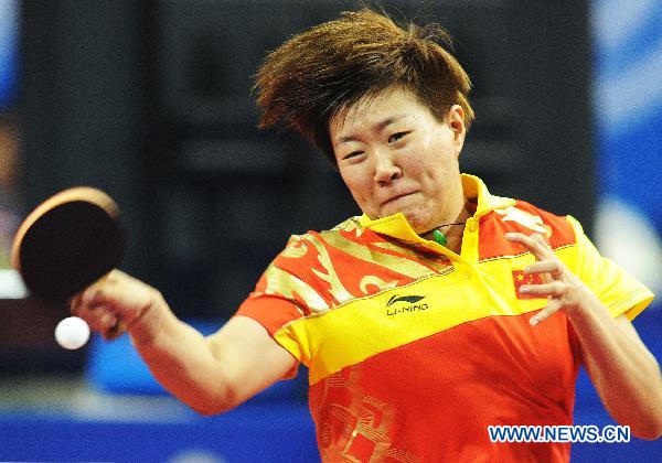 Guo Yan of China returns the ball during the women's table tennis team event quarterfinal against India at the 16th Asian Games in Guangzhou, south China's Guangdong Province, Nov. 14, 2010. China won the match 3-0. (Xinhua/Xu Jiajun)