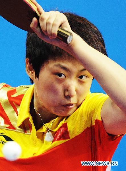 Guo Yue of China returns the ball during the women's table tennis team event quarterfinal against India at the 16th Asian Games in Guangzhou, south China's Guangdong Province, Nov. 14, 2010. China won the match 3-0. (Xinhua/Xu Jiajun)