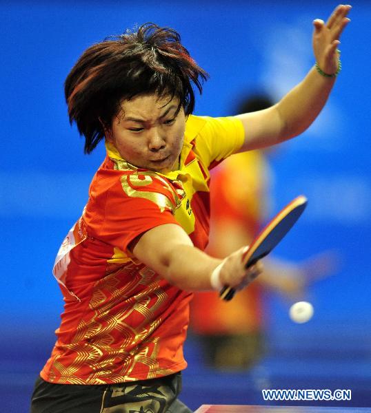 Li Xiaoxia of China returns the ball during the women's table tennis team event quarterfinal against India at the 16th Asian Games in Guangzhou, south China's Guangdong Province, Nov. 14, 2010. China won the match 3-0. (Xinhua/Chen Yehua) 