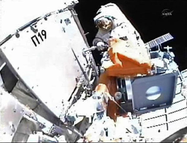 Russian cosmonauts Fyodor Yurchikhin works outside the International Space Station in this view from the helmet camera of fellow spacewalker Oleg Skripochka as the pair work to outfit the Russian segment of the orbiting laboratory for future assembly work and to support external experiments November 15, 2010. 