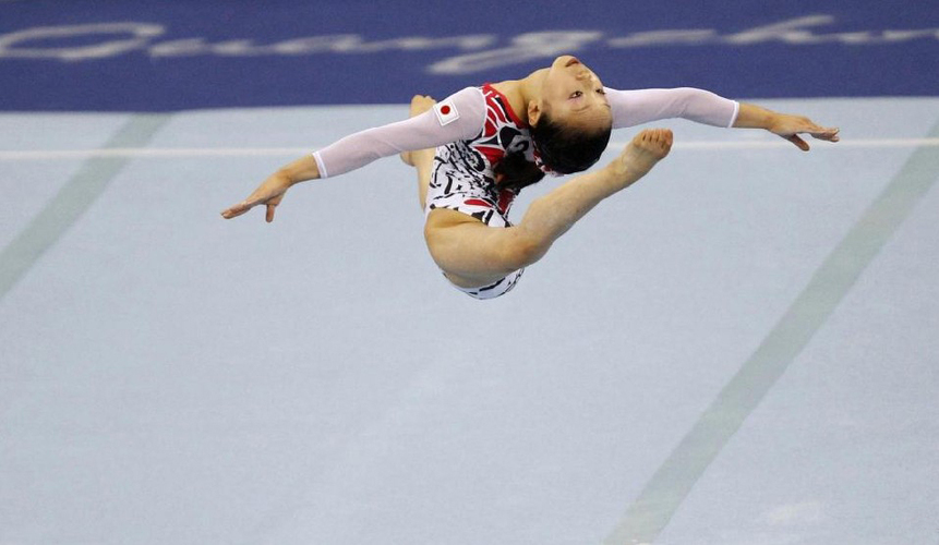 Japan&apos;s Mai Yamagishi competes in the women&apos;s floor final during artistic gymnastics at the 16th Asian Games in Guangzhou, Guangdong province, November 17, 2010. Yamagishi received the silver medal. [China Daily/Agencies]