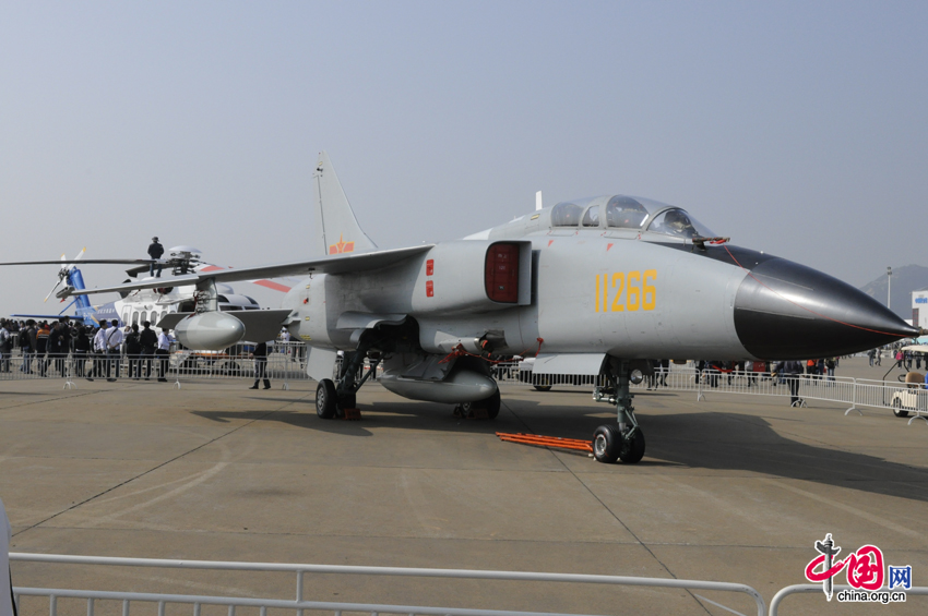 A PLA JH-7A fighter jet lands in Zhuhai during the 8th China International Aviation and Aerospace Exhibition, South China&apos;s Guangdong province. The exhibition is open to the public from Nov. 16, 2010 to Nov. 21, 2010. [China.org.cn] 