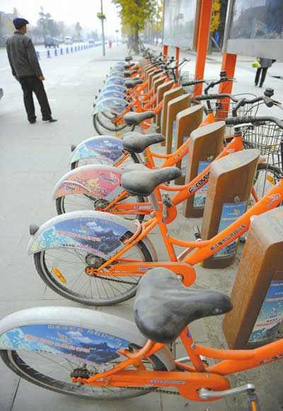 This photo shows bicycles - that are available for use free of charge - covered with dust as they remain unused
