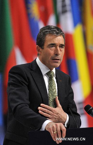 NATO's Secretary General Anders Fogh Rasmussen addresses a press conference of the NATO Summit in Lisbon, capital of Portugal, on Nov. 19, 2010. Leaders from 28 NATO countries endorsed new Strategic Concept at the military bloc's annual summit held here on Friday. [Wu Wei/Xinhua]