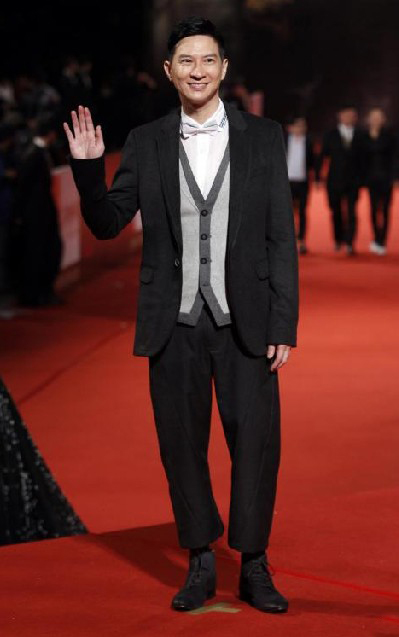 Actor Nick Cheung Ka-fai poses on the red carpet at the 47th Golden Horse Film Awards in Taoyuan Nov 20, 2010. [China Daily/Agencies]