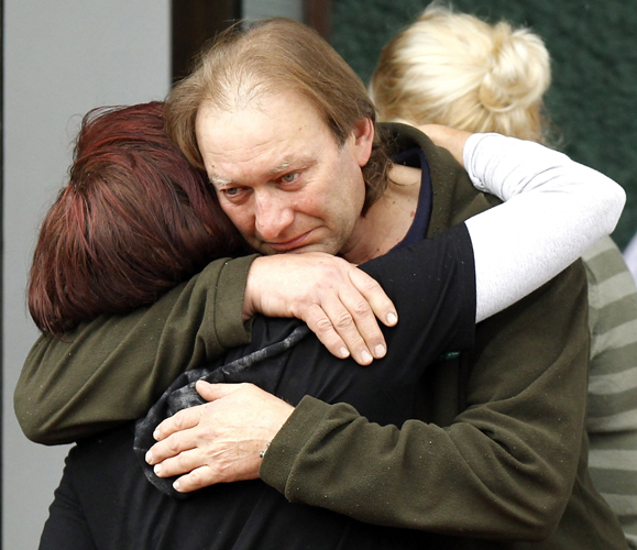 Relatives of one of the 29 miners and contractors trapped in the Pike River Mine leave a meeting in Greymouth November 20, 2010. New Zealand rescuers have yet to make contact with 29 trapped miners as fears of lethal gas levels prevented any chance of a rescue on Saturday, 24 hours after an explosion ripped through the remote colliery dug into the side of a mountain. [Xinhua/Reuters]