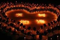 People across China light candles to mourn the Yushu earthquake dead and pray for the affected. 