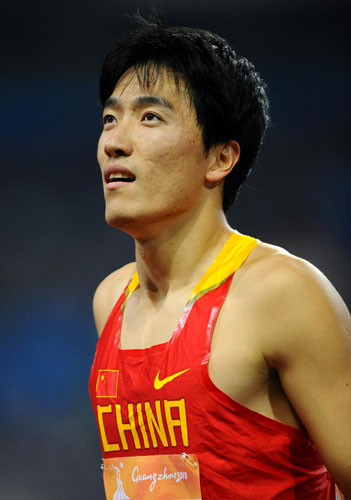 China&apos;s Liu Xiang reacts after the men&apos;s 110m hurdles heat at the 16th Asian Games in Guangzhou, south China&apos;s Guangdong province, Nov. 22, 2010. [Xinhua] 