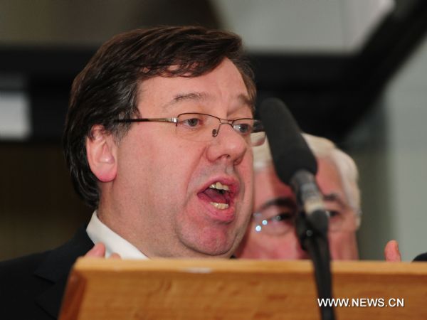 Irish Prime Minister Brian Cowen addresses a press conference at the Government Buildings in Dublin, Ireland, Nov. 22, 2010. Cowen declared on Monday he won't resign because he is determined to pass an emergency four-year budget. The Irish Green Party, member of the coalition government, appealed early on Monday to dissolve the parliament in January for an early election, after the government confirmed accepting a massive EU-IMF bailout for the country's debt crisis. [Zeng Yi/Xinhua]