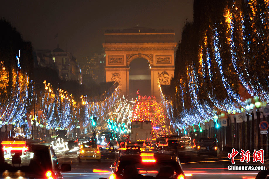 Paris&apos;s famous avenue, the Champs Elysees, was illuminated by Christmas lights on Monday, after they were switched on by the city&apos;s mayor Bertrand Delanoe, and actress Melanie Laurent. Flashing LED lights have been placed in the trees that line the famous avenue, creating a &apos;snowing&apos; effect. [Chinanews.com] 