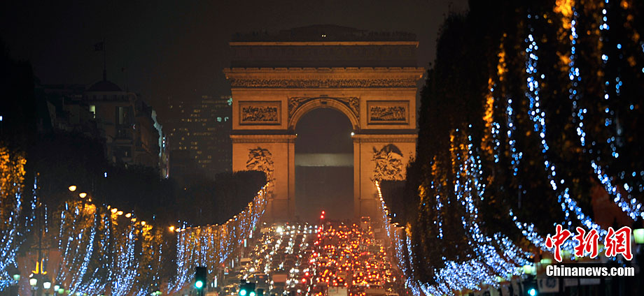 Paris&apos;s famous avenue, the Champs Elysees, was illuminated by Christmas lights on Monday, after they were switched on by the city&apos;s mayor Bertrand Delanoe, and actress Melanie Laurent. Flashing LED lights have been placed in the trees that line the famous avenue, creating a &apos;snowing&apos; effect. [Chinanews.com] 