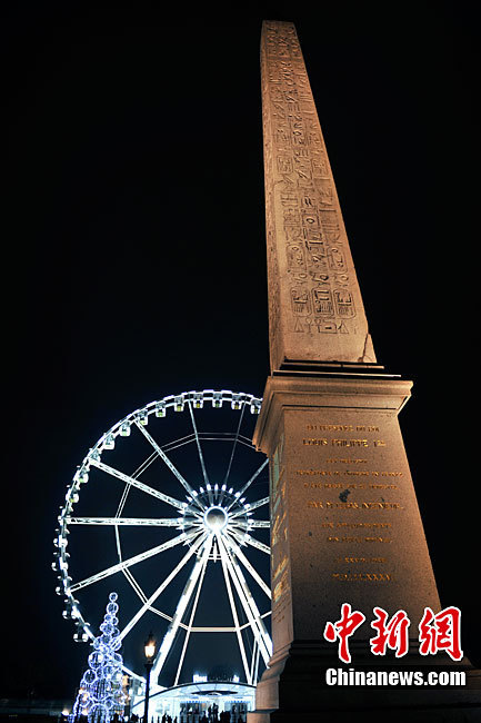 Paris&apos;s famous avenue, the Champs Elysees, was illuminated by Christmas lights on Monday, after they were switched on by the city&apos;s mayor Bertrand Delanoe, and actress Melanie Laurent. Flashing LED lights have been placed in the trees that line the famous avenue, creating a &apos;snowing&apos; effect. [Chinanews.com] 