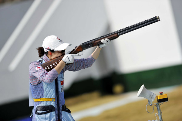 Wei Ning of China competes during the competition of Women's Skeet Team of shooting at the 16th Asian Games in Guangzhou, south China's Guangdong Province, Nov. 23, 2010. The team of China claimed the title. (Xinhua/Chen Yehua) 