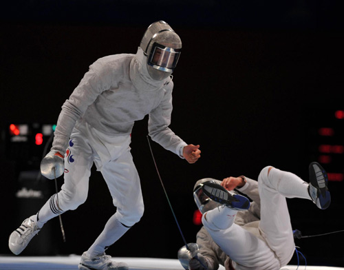 China claims men's sabre team gold with narrow win