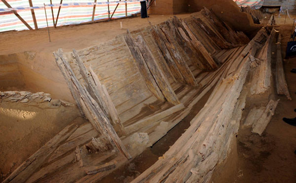 An ancient wooden ship was uncovered at a construction site in Heze, East China's Shandong province. [Xinhua]     