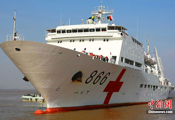 China's first hospital ship Daishandao, nicknamed 'Peace Ark', came home on Friday after treating thousands of people in Africa and South Asia in its maiden overseas medical mission.