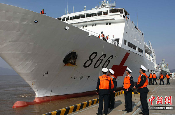 China's first hospital ship Daishandao, nicknamed 'Peace Ark', came home on Friday after treating thousands of people in Africa and South Asia in its maiden overseas medical mission.