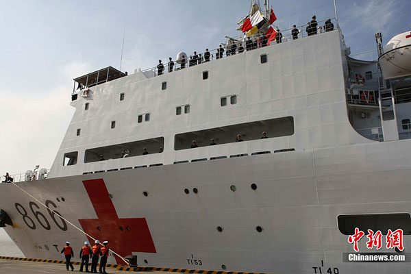 China's first hospital ship Daishandao, nicknamed 'Peace Ark', came home on Friday after treating thousands of people in Africa and South Asia in its maiden overseas medical mission.