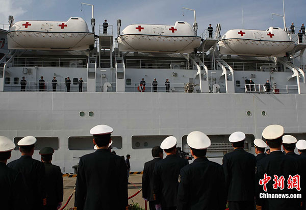 China's first hospital ship Daishandao, nicknamed 'Peace Ark', came home on Friday after treating thousands of people in Africa and South Asia in its maiden overseas medical mission.