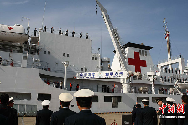 China's first hospital ship Daishandao, nicknamed 'Peace Ark', came home on Friday after treating thousands of people in Africa and South Asia in its maiden overseas medical mission.