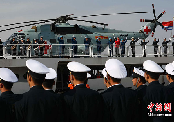 China's first hospital ship Daishandao, nicknamed 'Peace Ark', came home on Friday after treating thousands of people in Africa and South Asia in its maiden overseas medical mission.