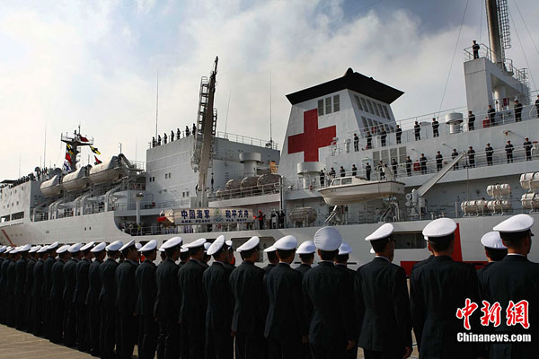 China's first hospital ship Daishandao, nicknamed 'Peace Ark', came home on Friday after treating thousands of people in Africa and South Asia in its maiden overseas medical mission.