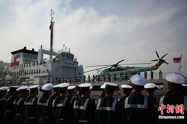 China's first hospital ship Daishandao, nicknamed 'Peace Ark', came home on Friday after treating thousands of people in Africa and South Asia in its maiden overseas medical mission.