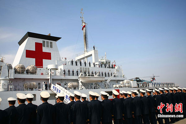 China's first hospital ship Daishandao, nicknamed 'Peace Ark', came home on Friday after treating thousands of people in Africa and South Asia in its maiden overseas medical mission.