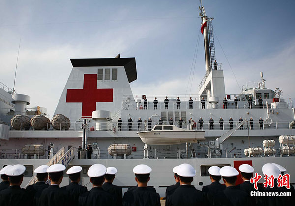 China's first hospital ship Daishandao, nicknamed 'Peace Ark', came home on Friday after treating thousands of people in Africa and South Asia in its maiden overseas medical mission.