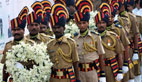 Indian policemen parade to mark Mumbai attacks