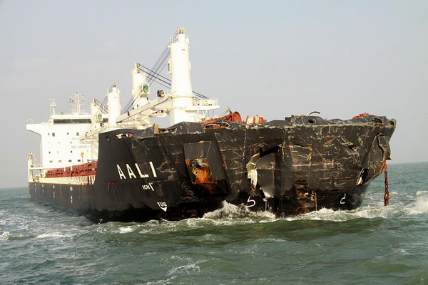 A damaged section of a Maltese vessel, after colliding with a Panamanian ship, is seen off the coast of Weihai, East China&apos;s Shandong province early Monday. All 49 crew members aboard the two foreign cargo ships have been rescued, the local maritime bureau said. [Xinhua] 