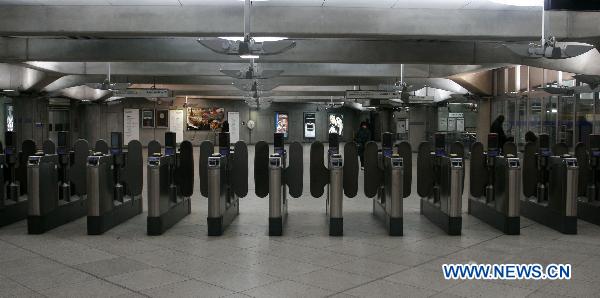 Photo taken on Nov. 29, 2010 shows the empty entrance of a tube station in London, Britain. Passengers on the London Underground network are enduring disruption to their journeys as thousands of members of the Transport Salaried Staffs Association (TSSA) and the Rail, Maritime and Transport Union (RMT) stage a 24-hour strike to protest planned job cuts from Sunday evening, the fourth 24-hour strike on London tube system since August. [Bimal Gautam/Xinhua]