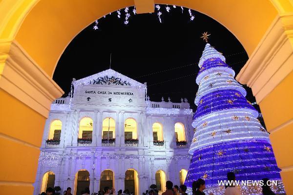 Illuminating decorations for the coming Christmas Day are seen during the lighting ceremony in Macao, south China, Dec. 2, 2010. [Xinhua]