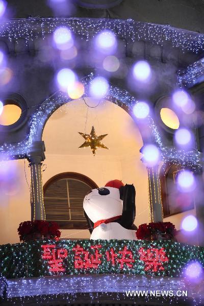 Illuminating decorations for the coming Christmas Day are seen during the lighting ceremony in Macao, south China, Dec. 2, 2010. [Xinhua]