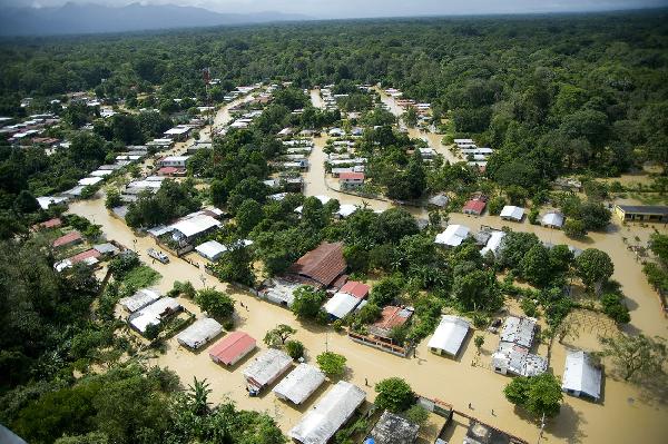 This image provided by the Venezuelan Government shows an aerial view of flooded areas in Barlovento, Miranda State, Venezuela, on Dec. 2, 2010. [Xinhua/Venezuelan Government]