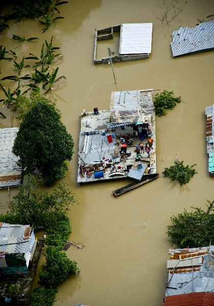 This image provided by the Venezuelan Government shows an aerial view of flooded areas in Barlovento, Miranda State, Venezuela, on Dec. 2, 2010. [Xinhua/Venezuelan Government] 