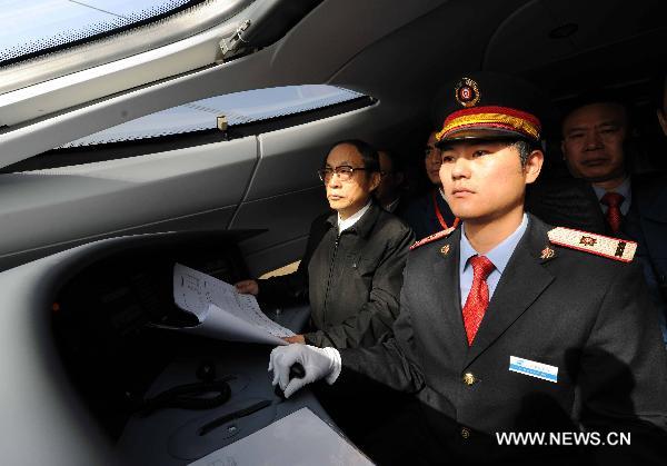 The driver operates the train CRH380A of China Railway High-Speed (CRH), which runs between the north China&apos;s Zaozhuang city and Bengbu in the south, a segment of the Beijing-Shanghai high-speed rail line, Dec. 3, 2010. China&apos;s high-speed train CRH380A hit a maximum speed of 486.1 kilometers per hour on Friday during its trial service, which broke a world operation speed record. [Xinhua]