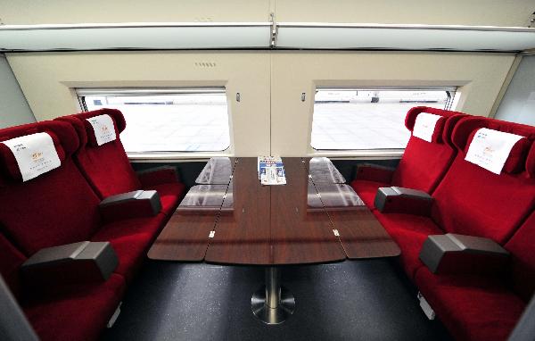 Photo taken on Dec. 3, 2010 shows a compartment on a train of CRH380A of China Railway High-Speed (CRH), in Guangzhou, capital of south China's Guangzhou Province. China's high-speed train CRH380A, which has a maximum speed of 380 km/h during regular operations, and can keep a constant speed of 350 km/h, was put into service on the Wuhan-Guangzhou high-speed rail line on Friday. [Xinhua/Chen Yehua]