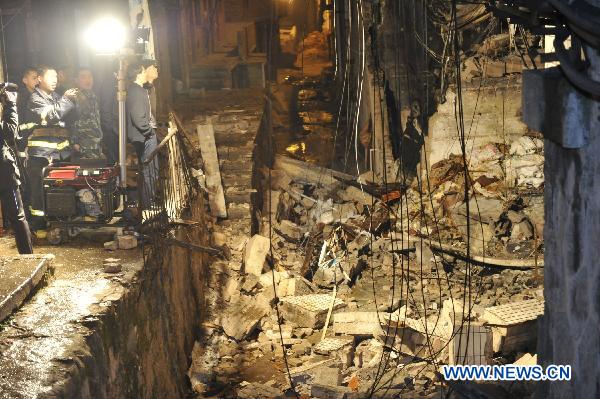 Photo taken on Dec. 4, 2010 shows the explosion site of an Internet Cafe in downtown of Kaili City in Miao-Dong Autonomous Prefecture of Qiandongnan, southwest China's Guizhou Province. Six people were killed and 37 others injured in an explosion that ripped through an Internet cafe at around 10:30 p.m. on Saturday, according to local police. (Xinhua/Ou Dongqu)