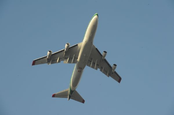 U.S Evergreen supertanker, the world&apos;s largest flying fire extinguisher, a Boeing 747 extinguishes fire near Isfiya, on Mount Carmel, near Haifa, north Israel, Dec. 5, 2010. After more than three days&apos; arduous battle, Israeli firefighting authority announced Sunday afternoon that it had fully contained the inferno, according to local news service Ynet. [Xinhua]