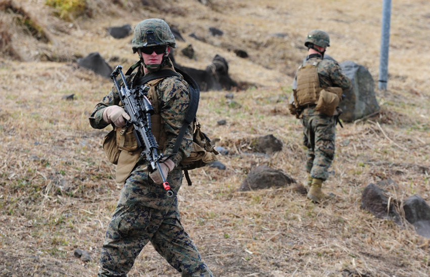 U.S. Marines attend a mock battle during ground medical-aid training in Kirishima Training Area in southern Japan&apos;s Miyazaki Prefecture, Dec. 7, 2010. Japan and the United States launched a major ground training in Kirishima Training Area Tuesday, as part of the biggest-ever joint military exercises which kicked off in several places in Japan last Friday. [Xinhua]