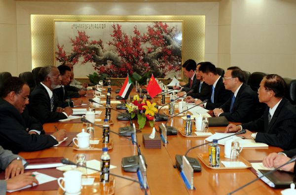 Chinese Foreign Minister Yang Jiechi (2nd R) meets with his Sudanese counterpart Ali Karti (2nd L) in Beijing, China, Dec. 8, 2010. [Zhang Duo/Xinhua]