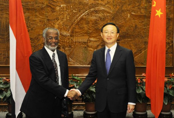 Chinese Foreign Minister Yang Jiechi (R) meets with his Sudanese counterpart Ali Karti in Beijing, China, Dec. 8, 2010. [Zhang Duo/Xinhua]