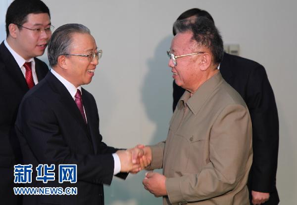Kim Jong-il (R), top leader of the Democratic People's Republic of Korea (DPRK), meets with visiting Chinese State Councilor Dai Bingguo in Pyongyang on Thursday December 9, 2010. [Xinhua] 