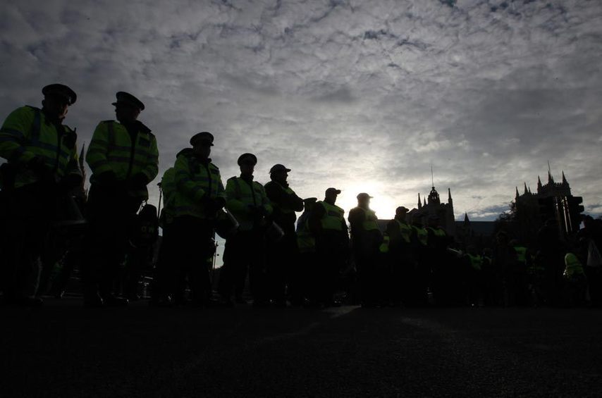 Over 20,000 students took to streets to protest against the coalition government&apos;s plan to raise the tuition fees cap in England from 3290 to 9,000 pounds per year, which was passed in the House of Commons Thursday, Dec. 9, 2010. More than a dozen of policemen and students have been injured during the clash. [Xinhua]