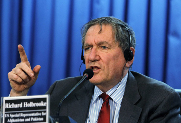 U.S. special representative to Pakistan and Afghanistan Richard Holbrooke reacts during a news conference in Kabul in this October 27, 2010 file photograph. Veteran U.S. diplomat Richard Holbrooke was in critical condition after doctors completed surgery to repair a tear in his aorta on December 11, 2010, the U.S. State Department said in a statement. [Xinhua/Reuters]