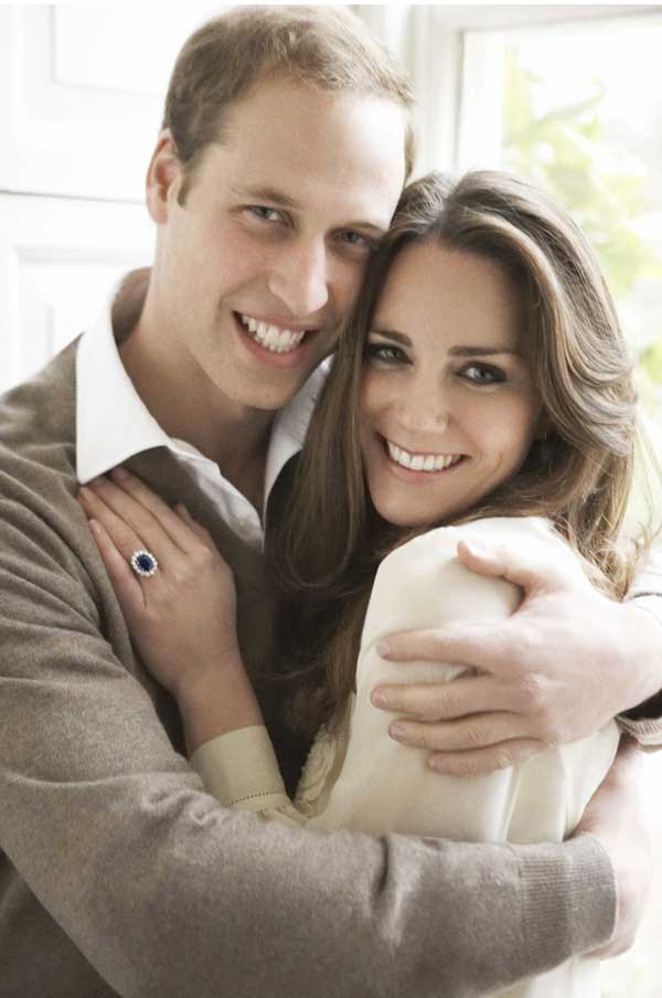 Britain's Prince William and Catherine Middleton pose in one of two official engagement portraits, taken by photographer Mario Testino in the Cornwall Room at St James's Palace in London on November 25, 2010. 